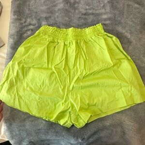 Neon green swim cover up shorts